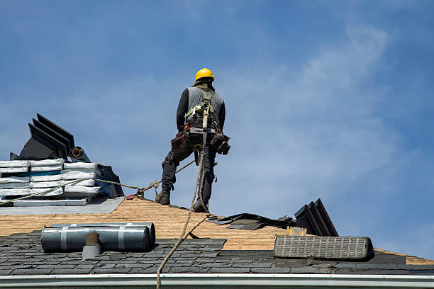 Professional Roofing technician working in Dallas, OR